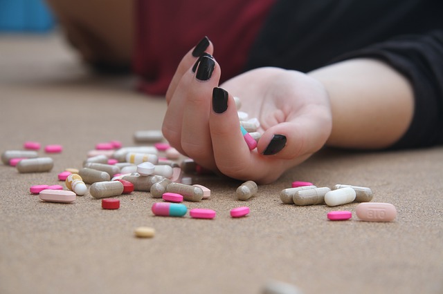 drugs-hand-floor