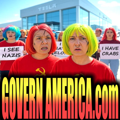 A group of individuals with brightly colored hair and angry facial expressions, standing in front of a building labeled "TESLA." The two individuals in the foreground are wearing red shirts with a hammer-and-sickle emblem, symbolizing communism. One has bright red hair and facial markings, while the other has neon green hair, a nose ring, and also has tatoos on the face. Behind them, other people hold signs with phrases such as "I SEE NAZIS" and "I HAVE CRABS." The text "GOVERNAMERICA.com" is prominently displayed in bold yellow and red at the bottom of the image. The overall tone suggests satire or social commentary.